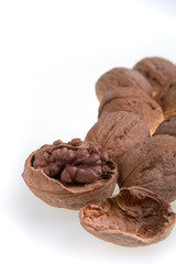 Walnut on a white background. Isolated. Dried nuts. Close up.