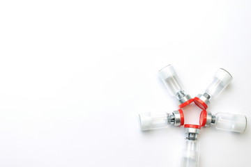 Medical background with five vials of medicine 
