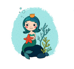 Beautiful little mermaid with a starfish sitting on a stone.