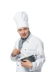 Chef interfere dish spoon in a pot on a white background