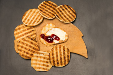 Sandwich with jam and toast on a black background
