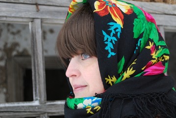 a woman in a colorful headscarf