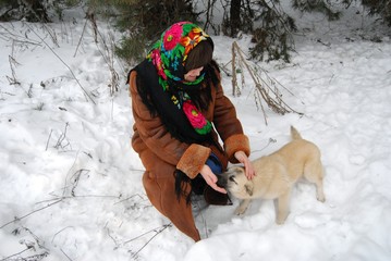 woman playing with a dog © st_fox