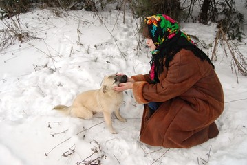 woman playing with a dog © st_fox