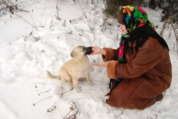 woman playing with a dog © st_fox