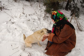 woman playing with a dog © st_fox