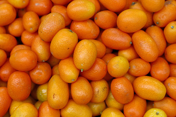 Fresh orange cumquat citrus fruits