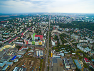 Naklejka premium Aerial view of city Ufa from traffic, buildings, river, forest