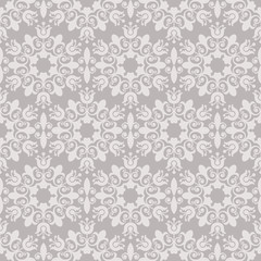 Seamless vintage beige floral vector wallpaper pattern.