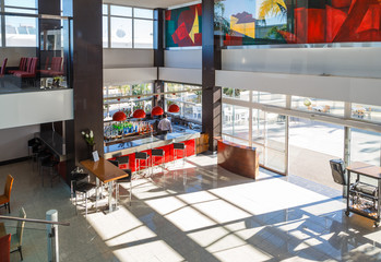 large bright hall in a futuristic style of modern hotel resort