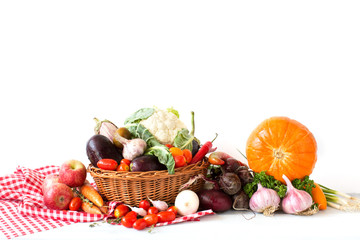 Fresh fruits and vegetables in a basket.