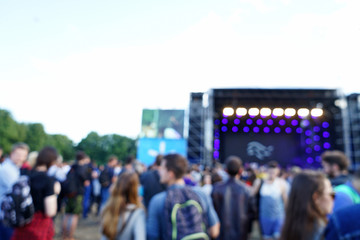 Blurred background of crowd at open air concert