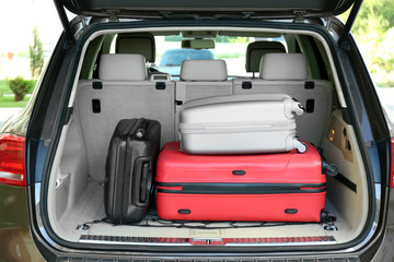 Car trunk with baggage © Africa Studio