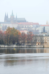 Panorama of an old Prague, bridges and embankment of Vitava river, Czechia