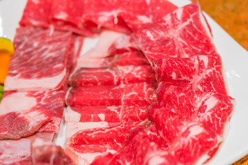 Uncooked raw fresh beef .