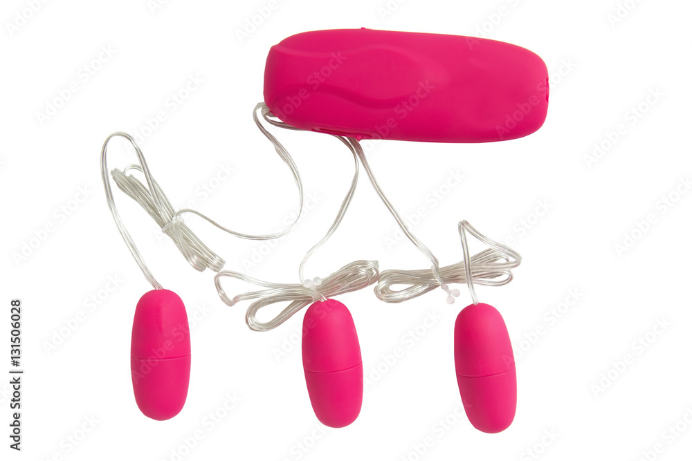 Wall mural Pink vibrator eggs - sex toy with control panel isolated