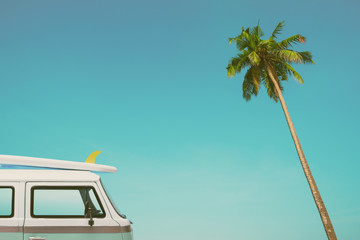 Tropical palm tree and blue sky background