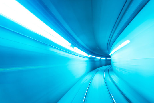 Speed motion blurred underground subway tunnel