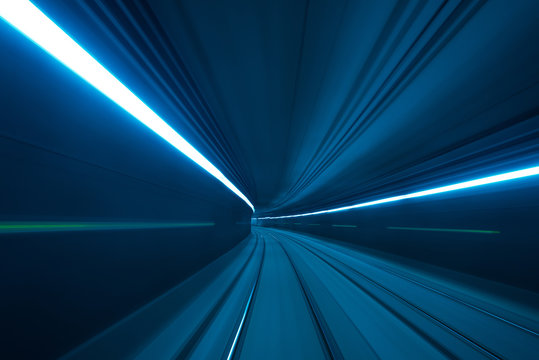 Fototapeta Speed motion blurred underground subway tunnel
