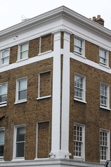 Georgian windows architecture on a wall house, London, UK
