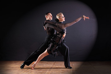 dancers in ballroom isolated on black background