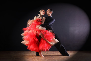 dancers in ballroom isolated on black background