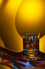 nice glass of cognac on the original reflection