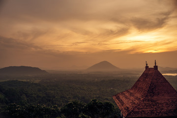 Sri Lanka: Danbulla cave temple and national park at the sunset
