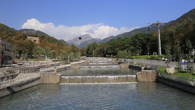 Artificial waterfalls on the river Damiraparanchaj. The cable car to the mountain Tufandag. Gabala. The Republic of Azerbaijan