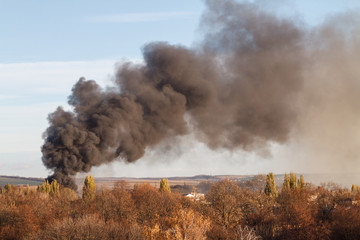 Images of smoke from a fire in the city.