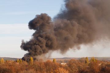 Images of smoke from a fire in the city.