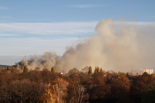 Images of smoke from a fire in the city.