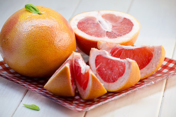 Fototapeta na wymiar sliced ripe grapefruit