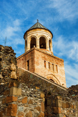 Fototapeta na wymiar Fort and wall of Svetitskhoveli Orthodox Cathedral in Mtskheta, Georgia
