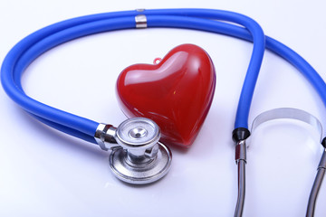 Red heart and a stethoscope on white background
