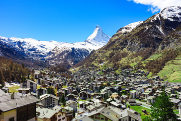 Zermatt village and Matterhorn Peak in background. - obrazy, fototapety, plakaty