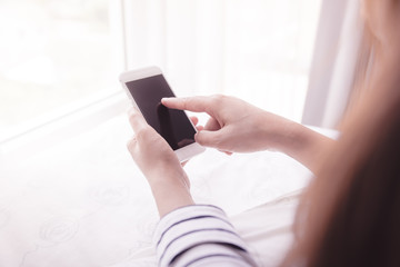 hands holding smartphone