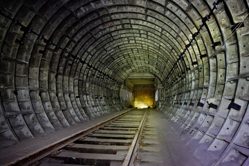 Abandoned round subway tunnel under construction.  