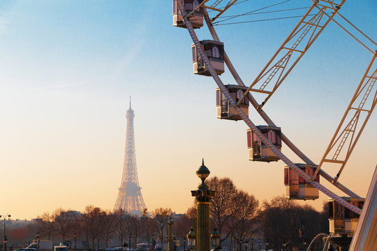 Paris, France, view on Concord square - observation wheel, tour Eiffel on horizon