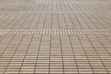 Brown brickwork on the  pavement