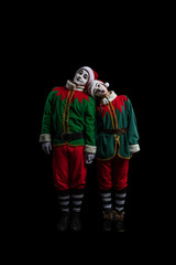Couple of mimes in New Year costumes isolated