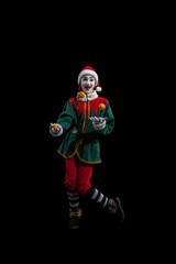 Obraz na płótnie Canvas Female mime in New Year costume isolated