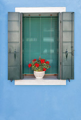 Colorful mediterranean window of Burano island, Venice, Italy