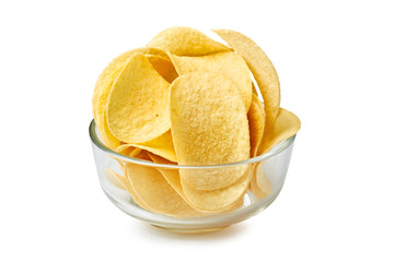 Potato chips in glass bowl on white