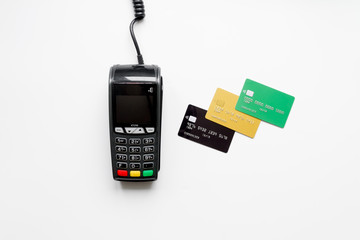 payment terminal with card on white background top view