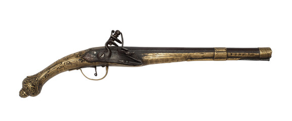 Old flintlock gun isolated on white.