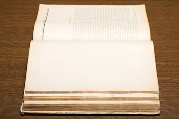 Open old book. Selective focus.