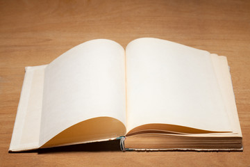 Open old book. Selective focus.