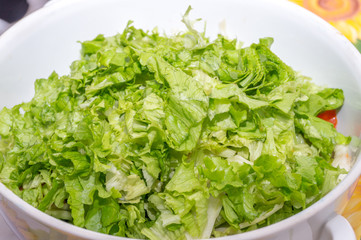 green salad in the foreground
