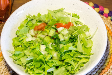 plate of mixed salad, with tomatoes